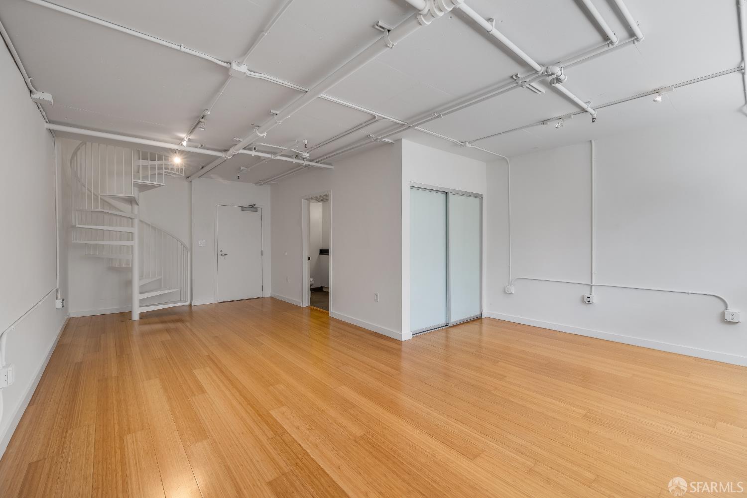 Harrison Street San Francisco, CA 94110 - Photo 18 of 26 a view of empty room with wooden floor