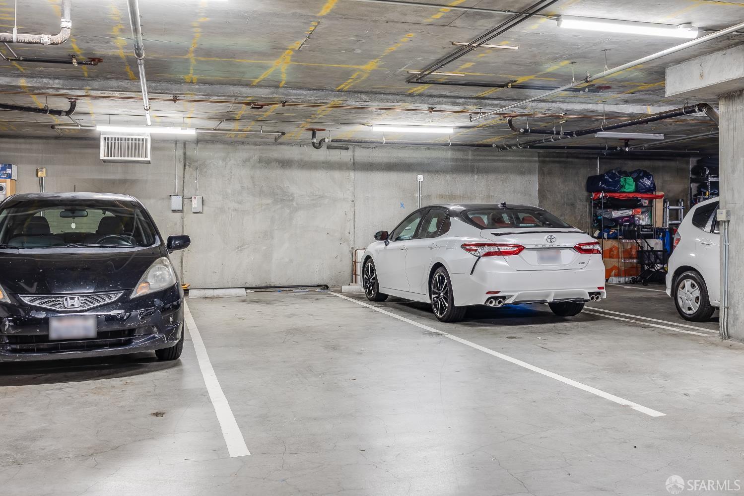 Harrison Street San Francisco, CA 94110 - Photo 21 of 26 a car and bike parked in a garage