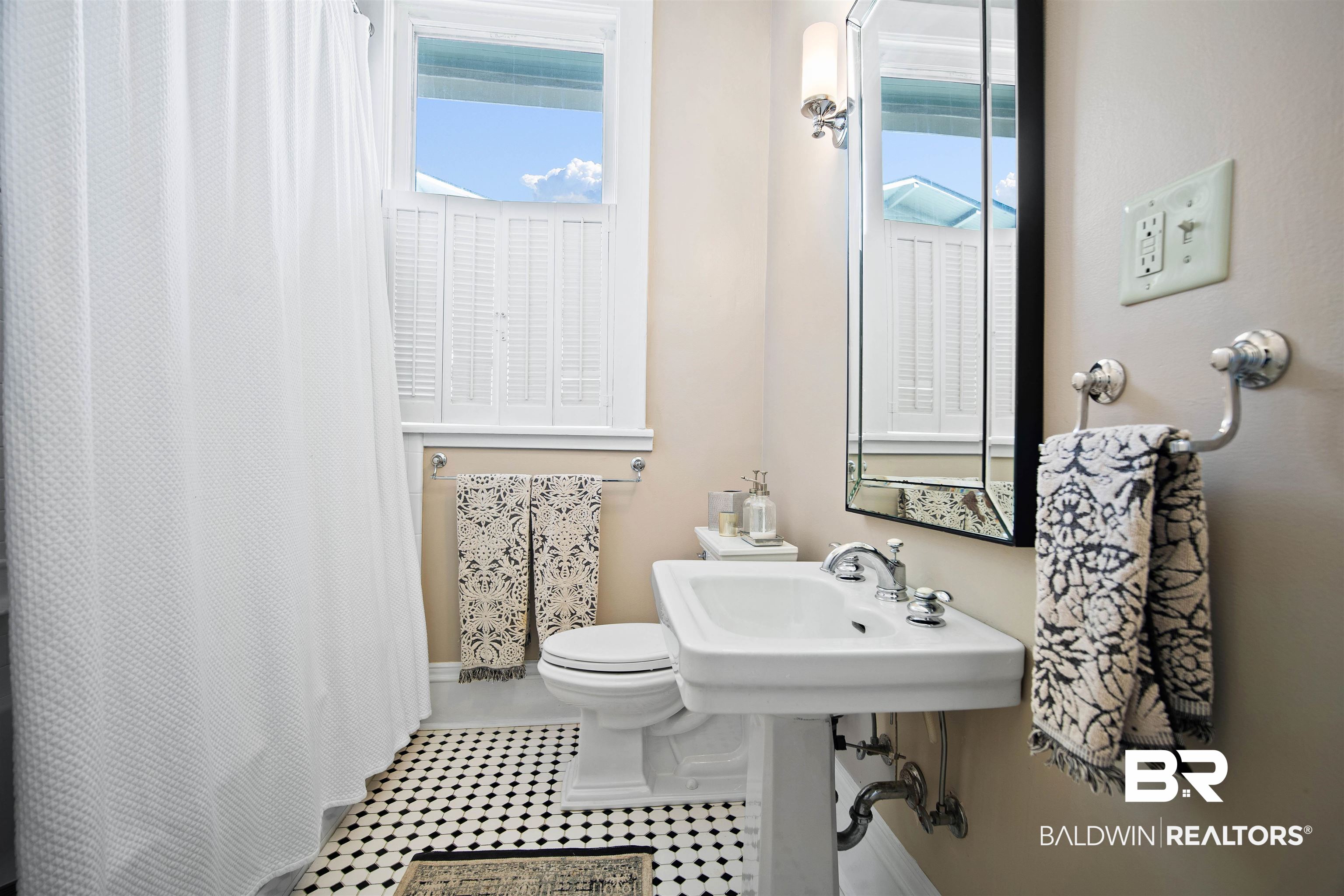 1314 Dauphin Street Mobile, AL 36604 - Photo 41 of 61 Bathroom featuring plenty of natural light and toilet