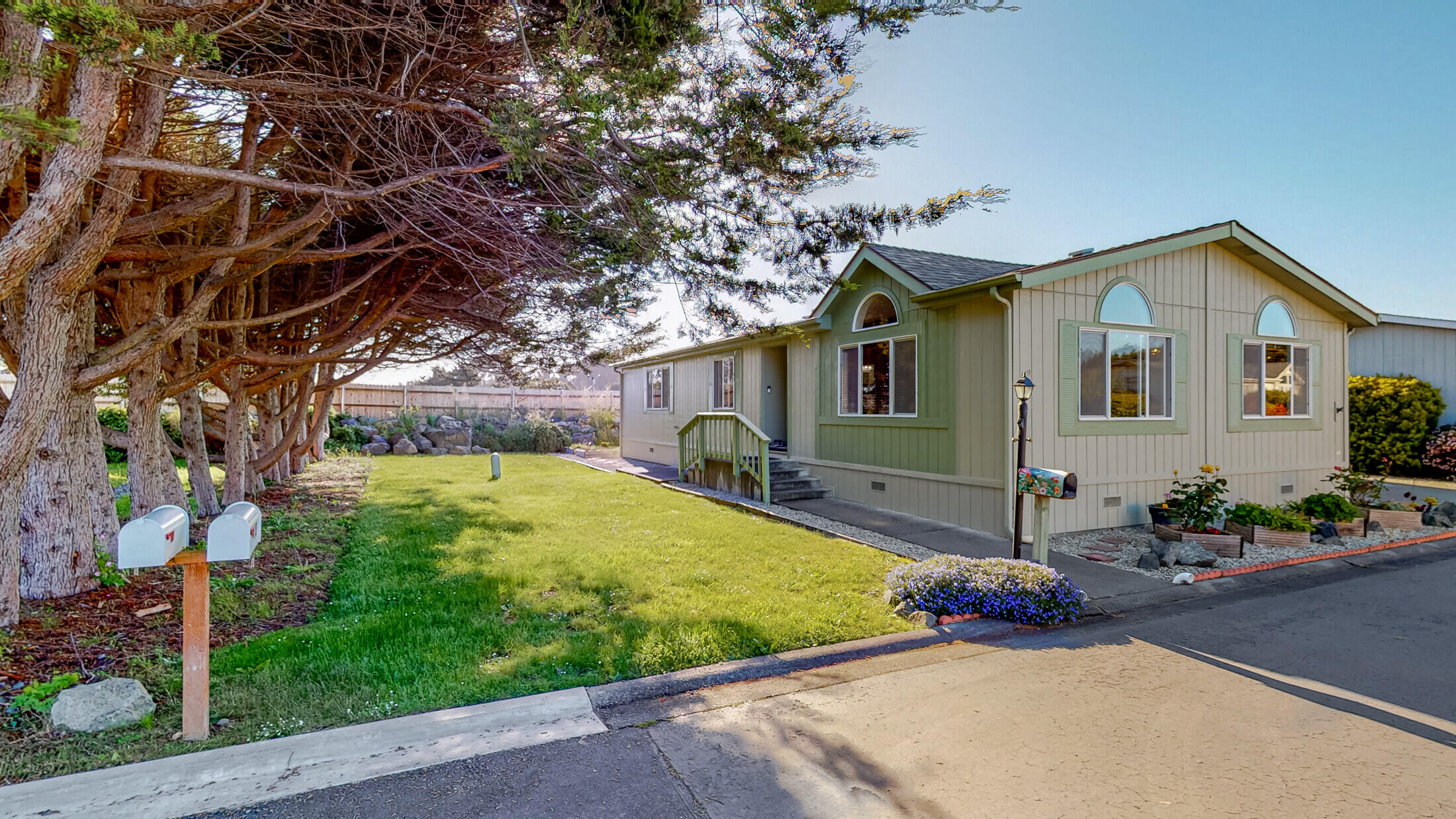 1090 Murray Road, Unit 119 McKinleyville, CA 95519 - Photo 1 of 1 a front view of a house with garden