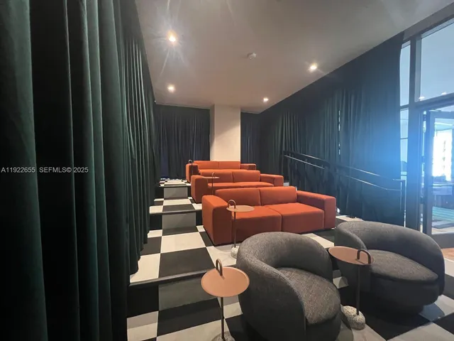 a room with furniture and wooden floor