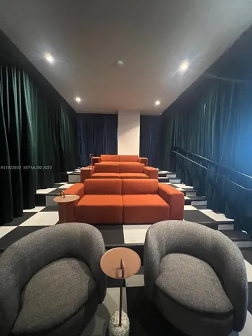 a work room with furniture and wooden floor