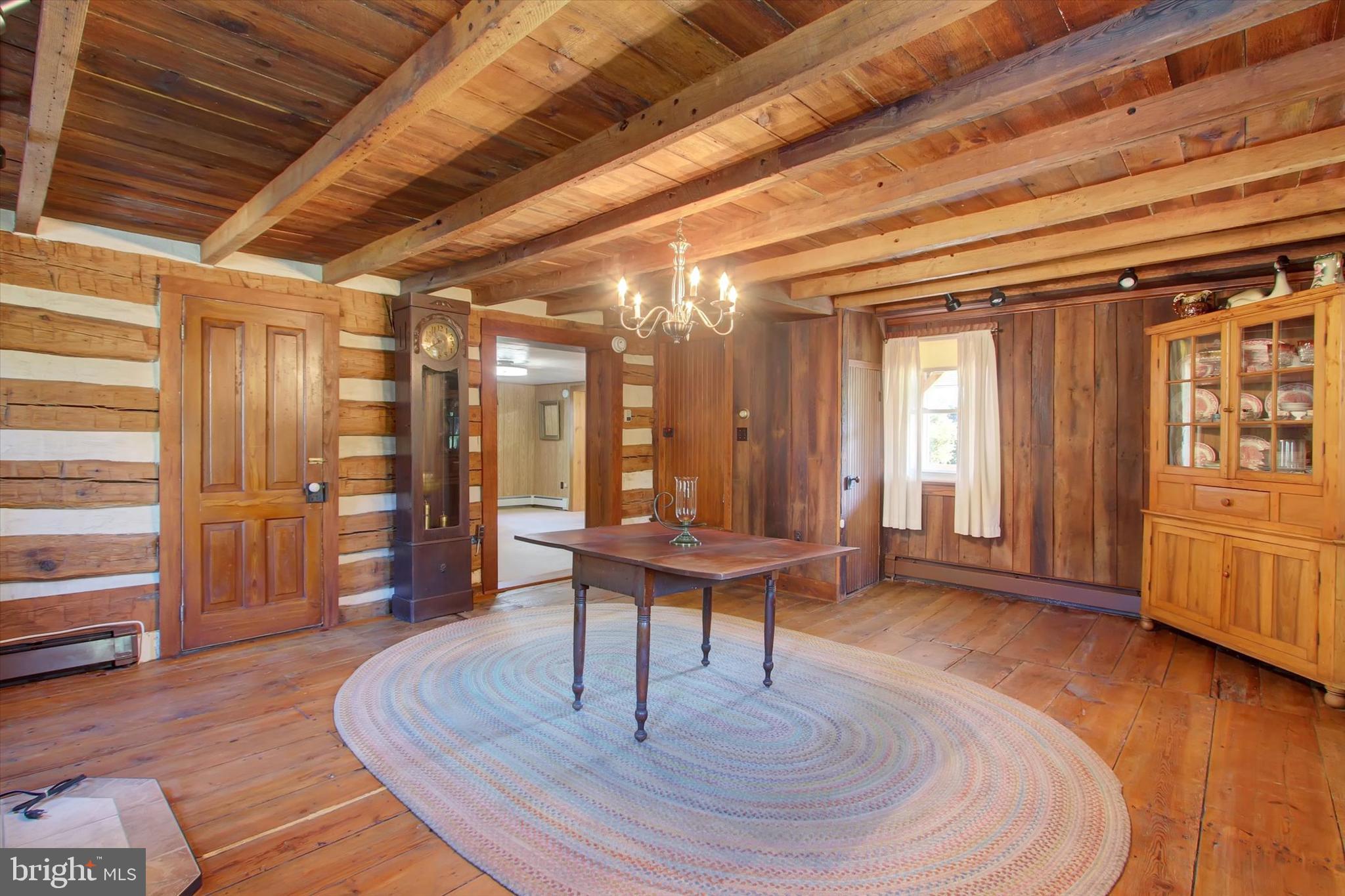 130 Spigot Valley Road Biglerville, PA 17307 - Photo 14 of 64 a living room with couches chairs and wooden floors