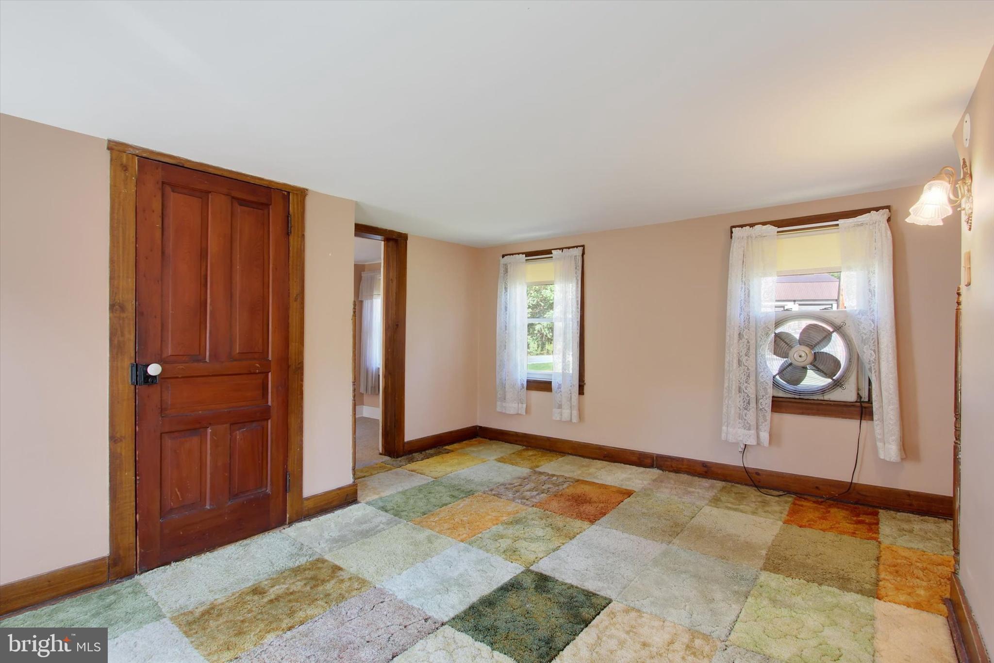 130 Spigot Valley Road Biglerville, PA 17307 - Photo 31 of 64 an empty room with windows and closet