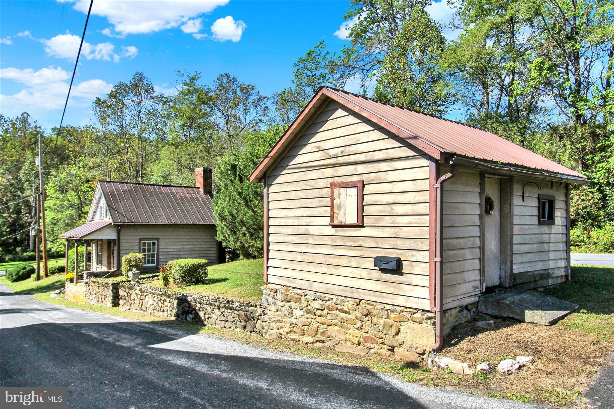 130 Spigot Valley Road Biglerville, PA 17307 - Photo 35 of 64 a view of house with yard and sitting area