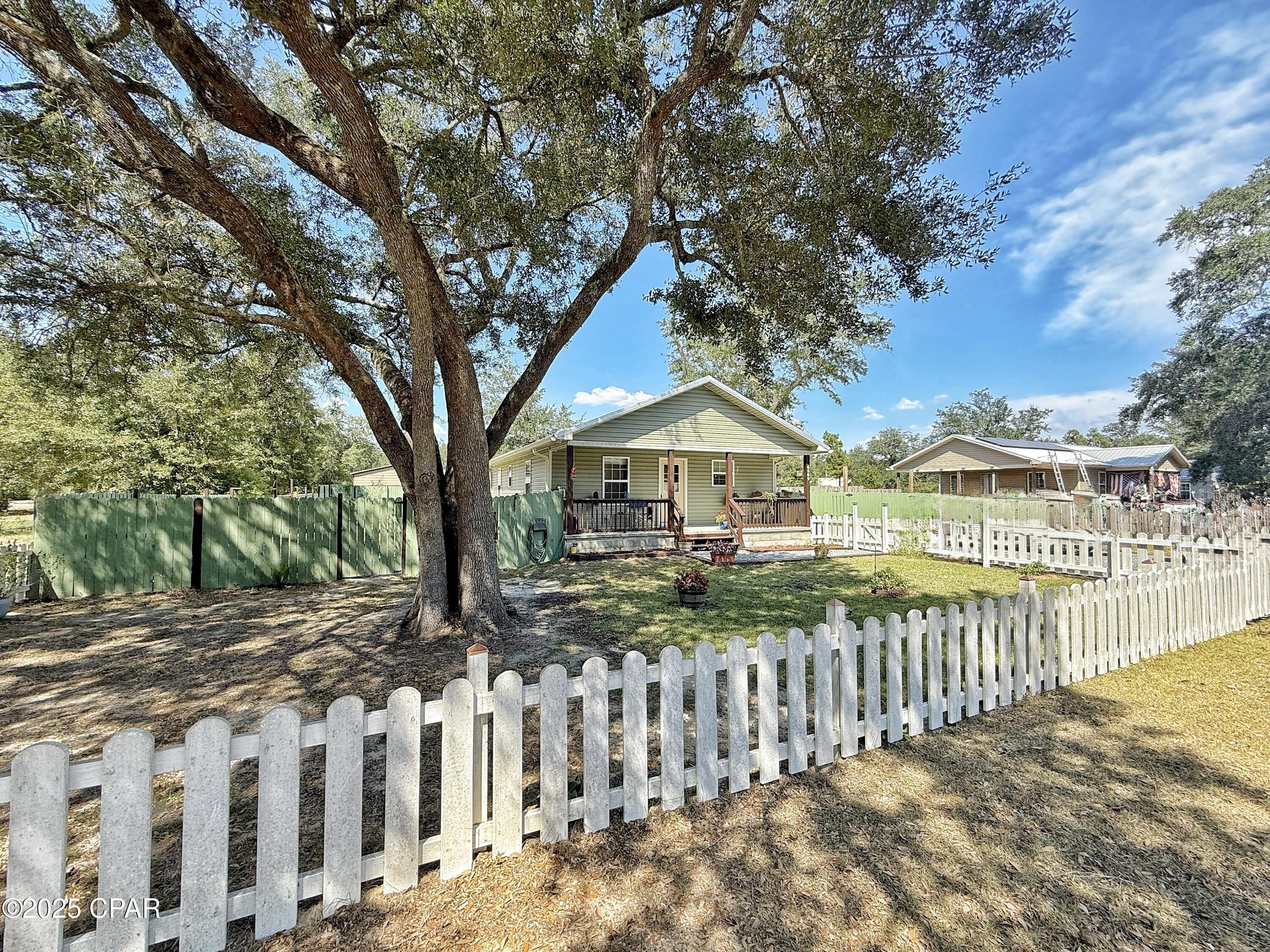 6589 Grande Oak Loop Grand Ridge, FL 32442 - Photo 2 of 36