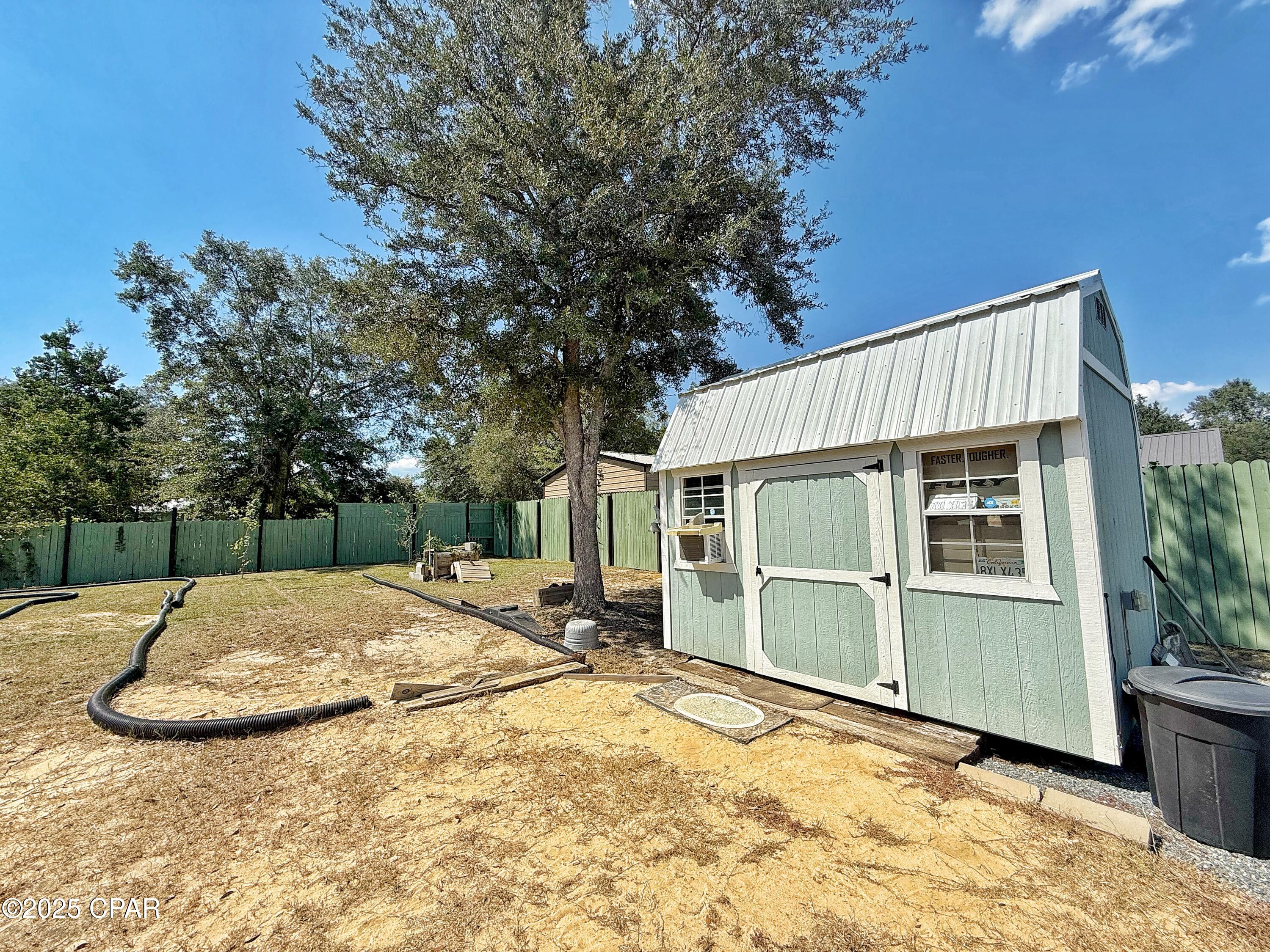 6589 Grande Oak Loop Grand Ridge, FL 32442 - Photo 25 of 36