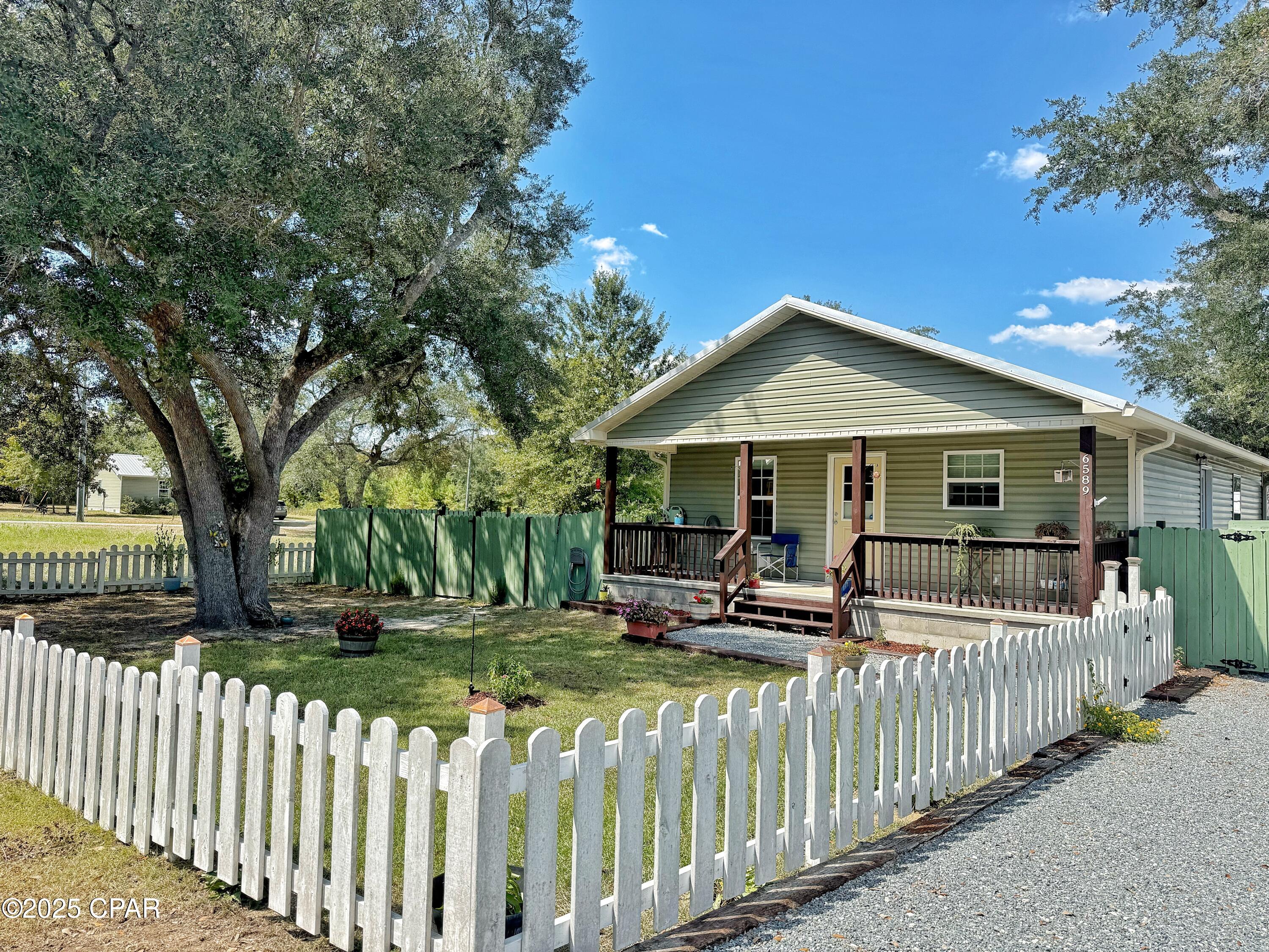 6589 Grande Oak Loop Grand Ridge, FL 32442 - Photo 33 of 36