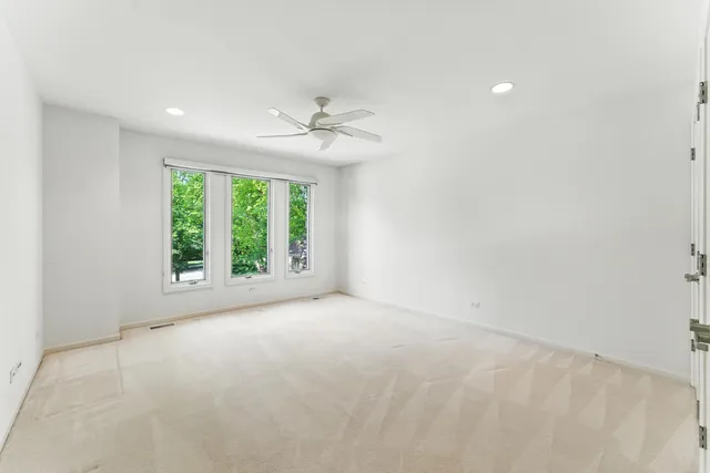 a bathroom with a sink a mirror and a window