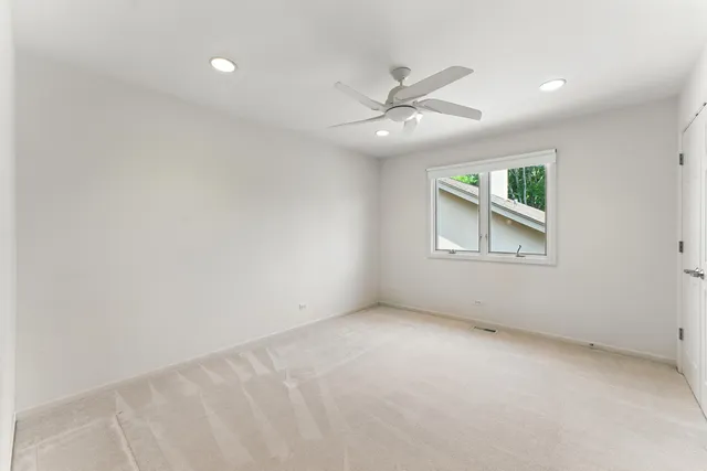 a view of balcony with wooden floor