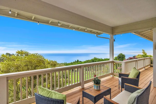a view of a two chair in the balcony