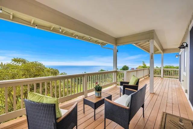 a view of livingroom with washer and dryer