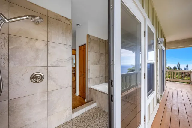 a view of parking garage with cars