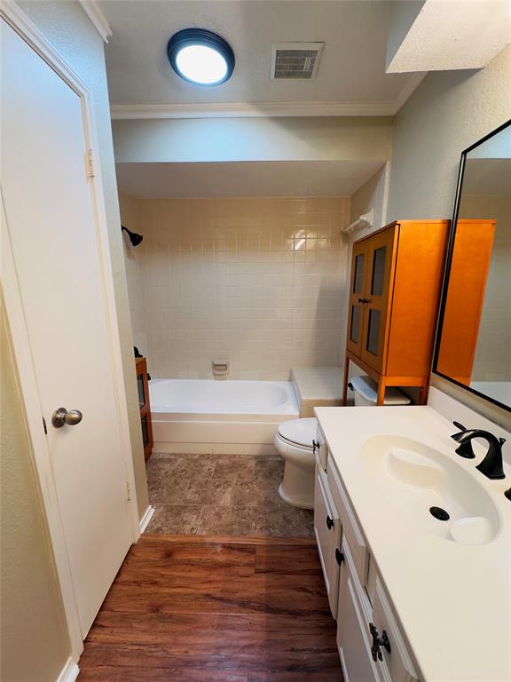 3929 St Christopher Lane Dallas, TX 75287 - Photo 11 of 22 a bathroom with a sink a toilet and shower