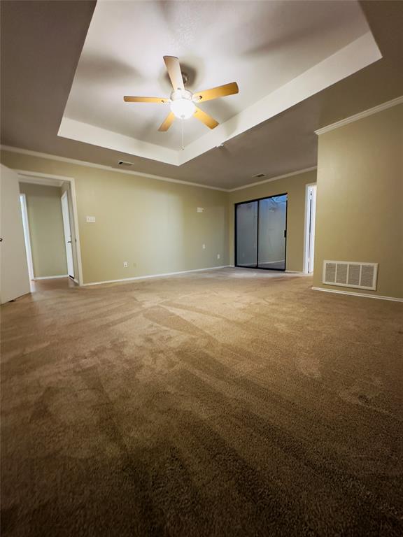 3929 St Christopher Lane Dallas, TX 75287 - Photo 14 of 22 a view of an empty room with a chandelier fan