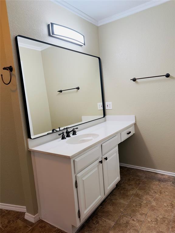 3929 St Christopher Lane Dallas, TX 75287 - Photo 15 of 22 a bathroom with a sink and a mirror