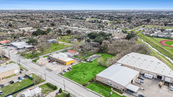 an aerial view of a house with a garden