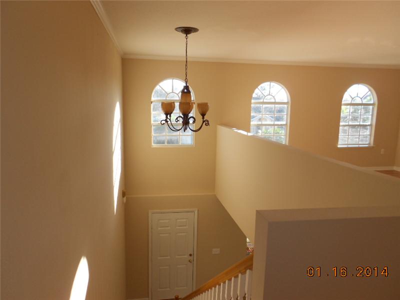 6044 Ridge Lake Circle Vero Beach, FL 32967 - Photo 11 of 14 a view of a livingroom with a window