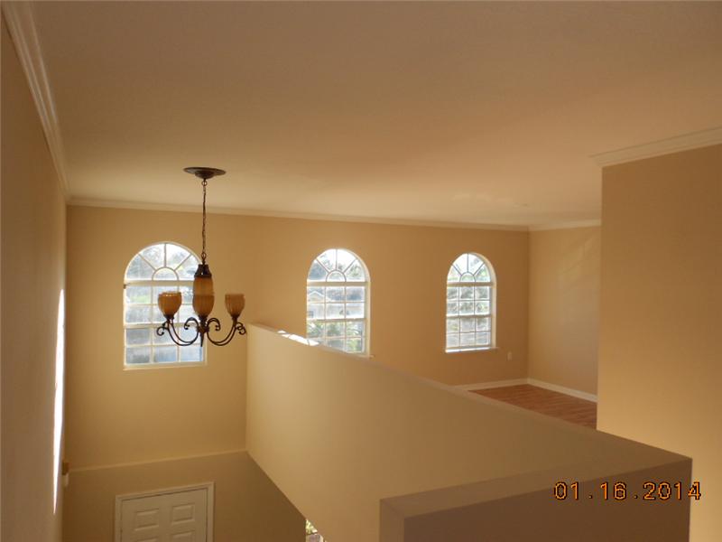 6044 Ridge Lake Circle Vero Beach, FL 32967 - Photo 6 of 14 a view of a livingroom with windows