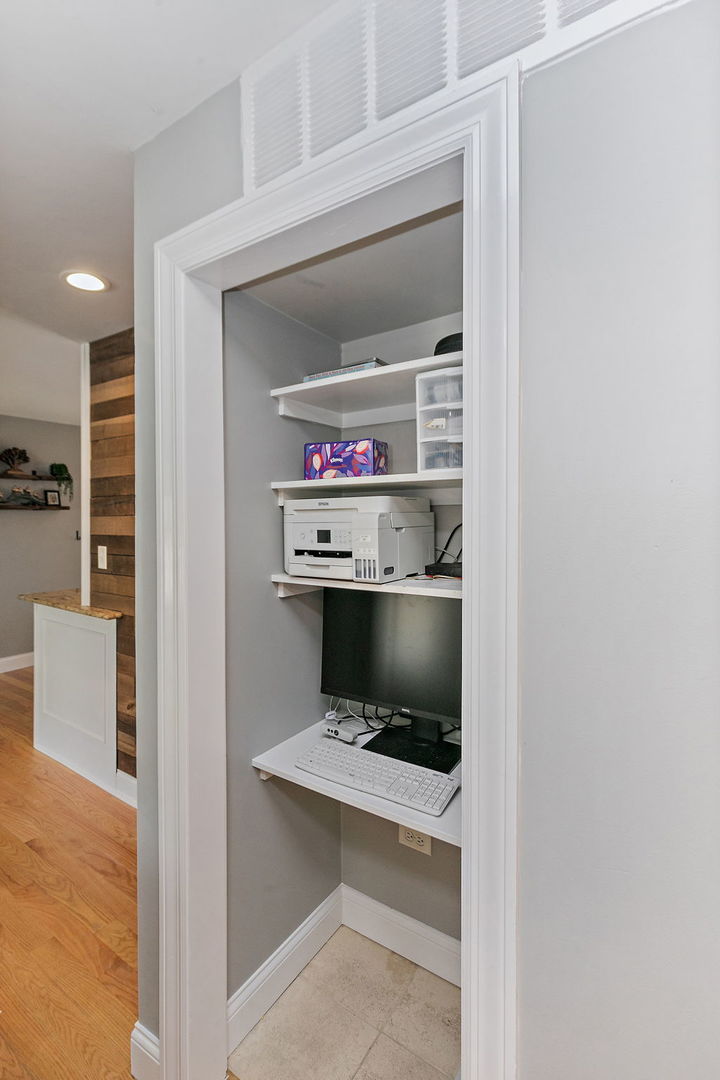 710 Olive Street Hoffman Estates, IL 60169 - Photo 12 of 30 a hallway with washer and dryer