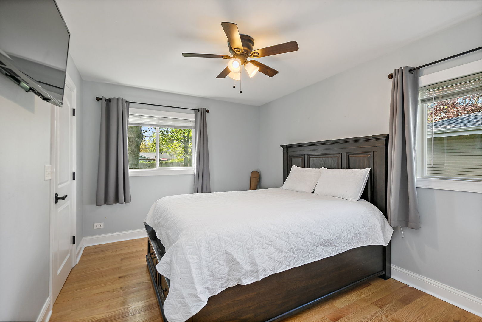 710 Olive Street Hoffman Estates, IL 60169 - Photo 13 of 30 a bedroom with a bed and window
