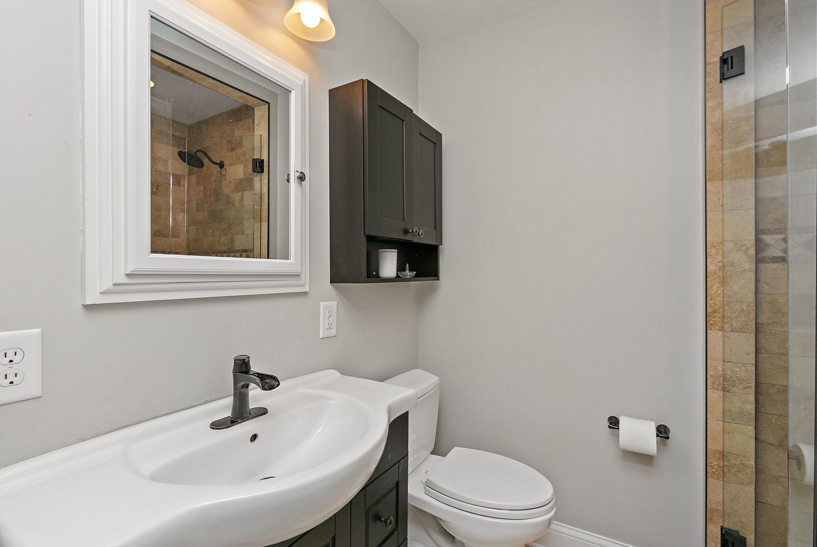 710 Olive Street Hoffman Estates, IL 60169 - Photo 14 of 30 a bathroom with a sink a toilet and mirror