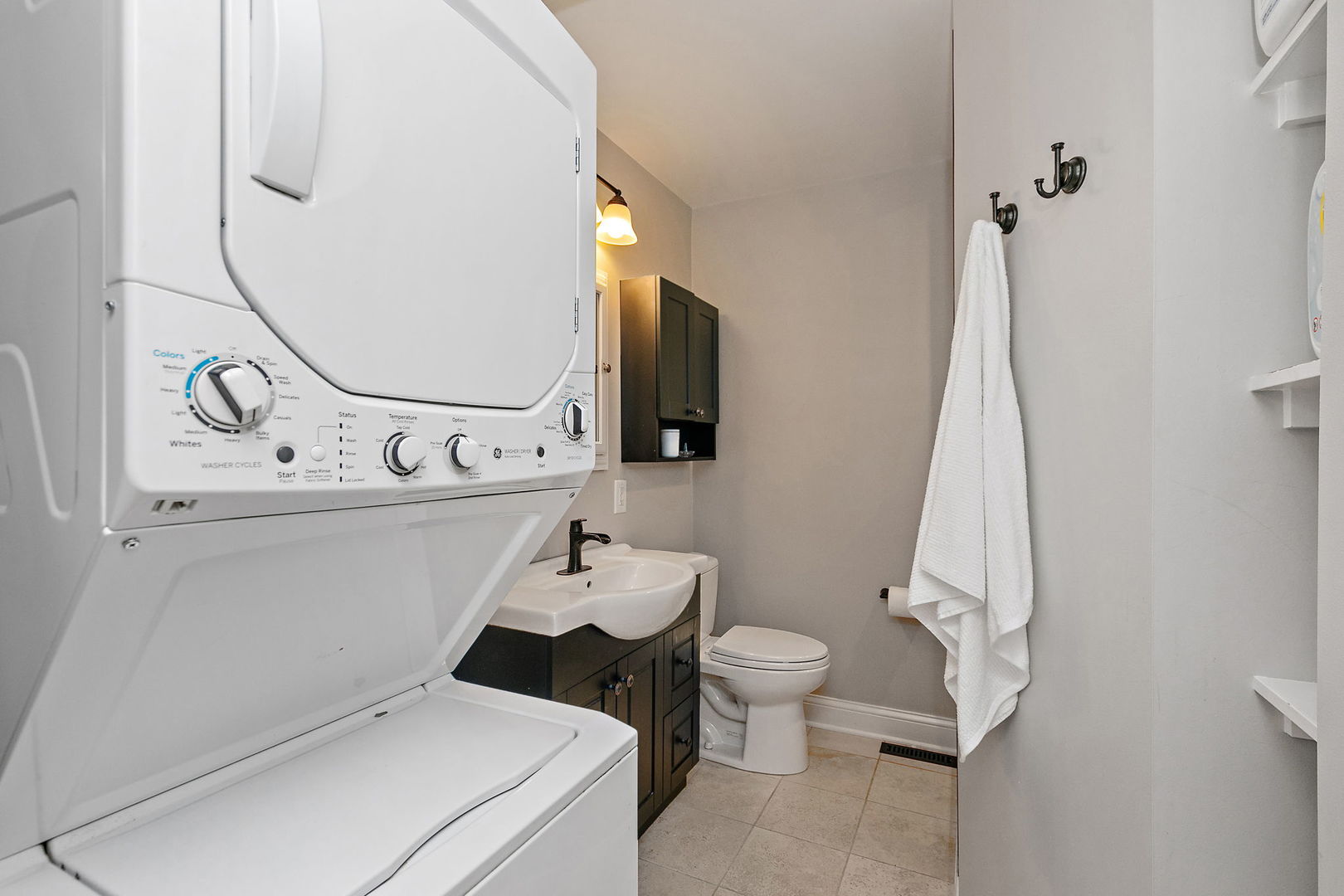 710 Olive Street Hoffman Estates, IL 60169 - Photo 16 of 30 a bathroom with a sink toilet and mirror