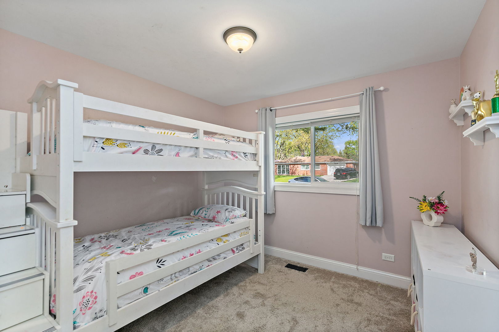 710 Olive Street Hoffman Estates, IL 60169 - Photo 17 of 30 a bedroom with a bed and a window