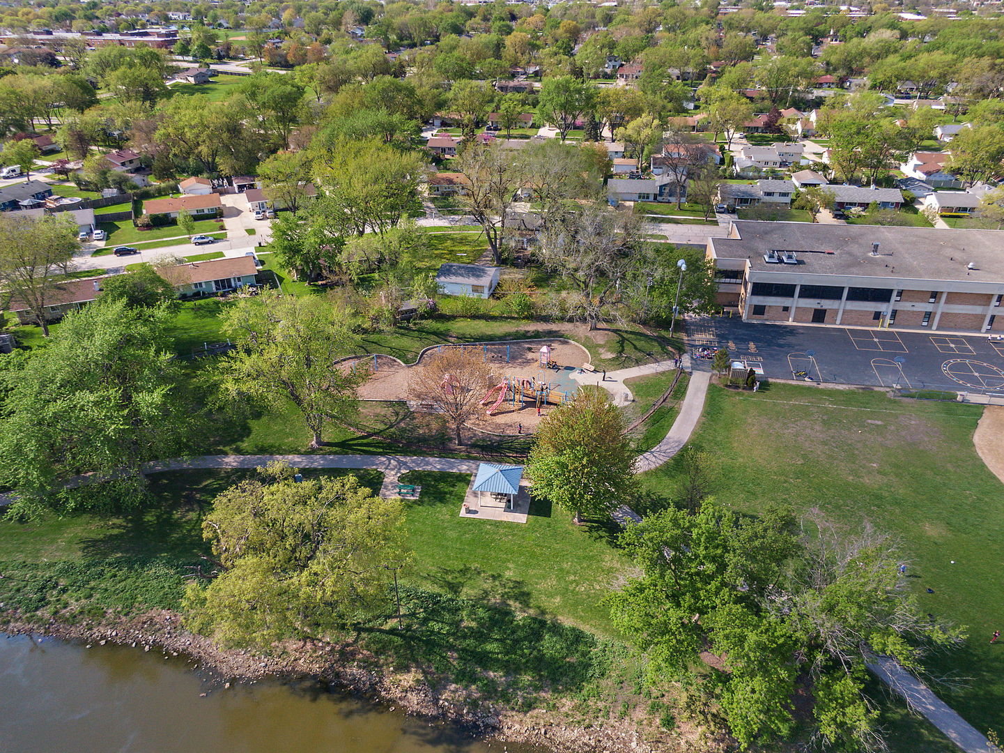 710 Olive Street Hoffman Estates, IL 60169 - Photo 26 of 30 an aerial view of residential houses with outdoor space and swimming pool