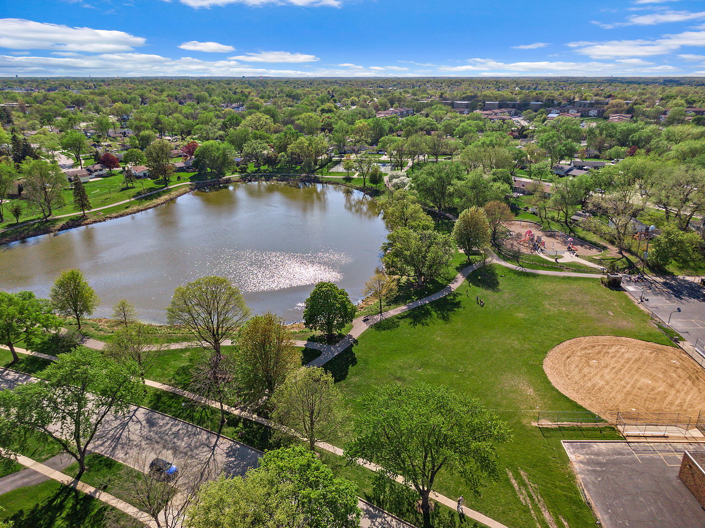 710 Olive Street Hoffman Estates, IL 60169 - Photo 29 of 30 an aerial view of residential houses with outdoor space and lake view