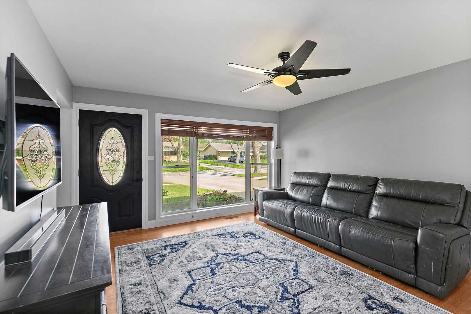 710 Olive Street Hoffman Estates, IL 60169 - Photo 5 of 30 a living room with furniture and a window