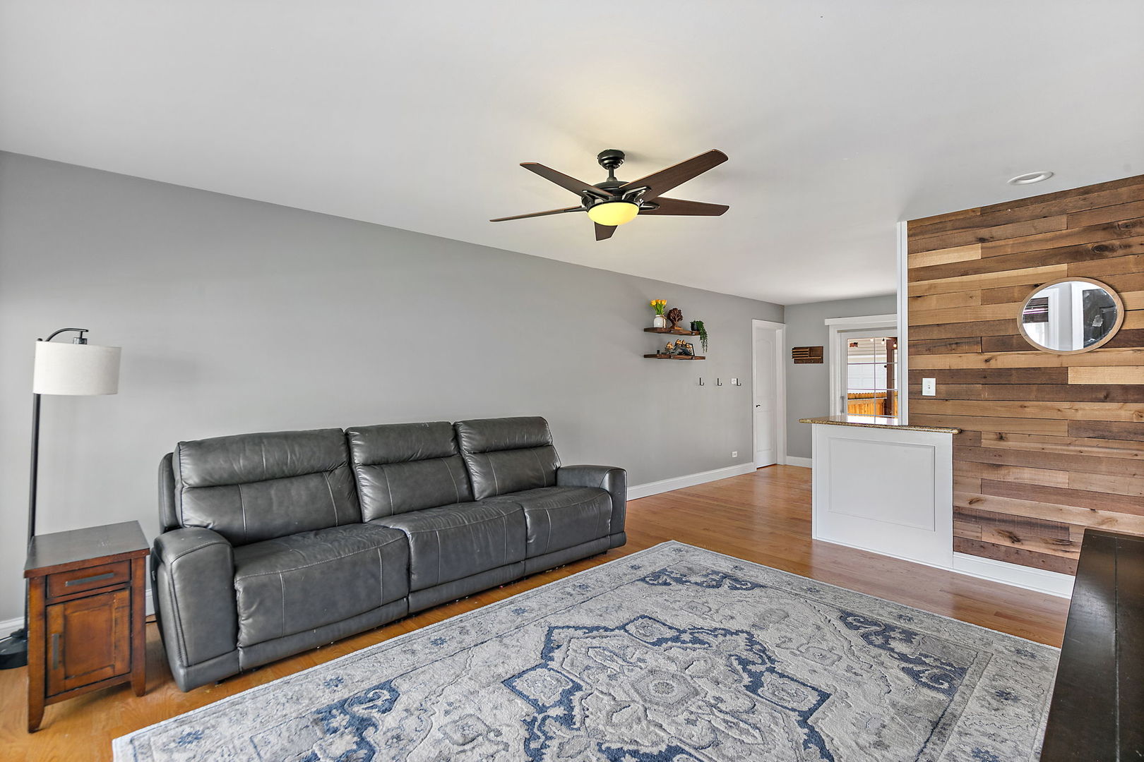 710 Olive Street Hoffman Estates, IL 60169 - Photo 6 of 30 a living room with furniture and a wooden floor