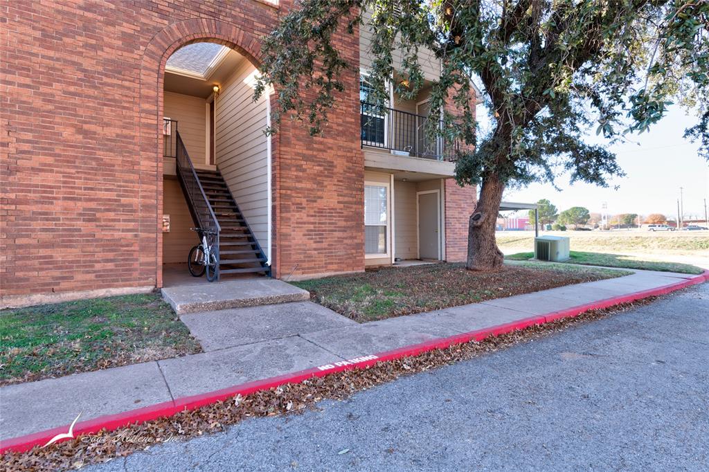 1318 Westheimer Road, Unit 217 Abilene, TX 79601 - Photo 1 of 16 a view of road and small yard