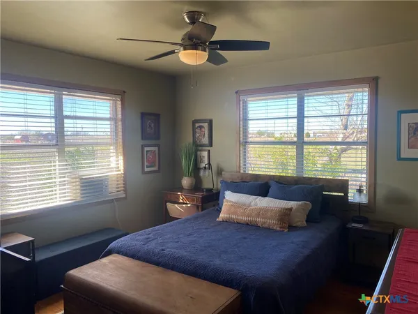 a living room with furniture and window