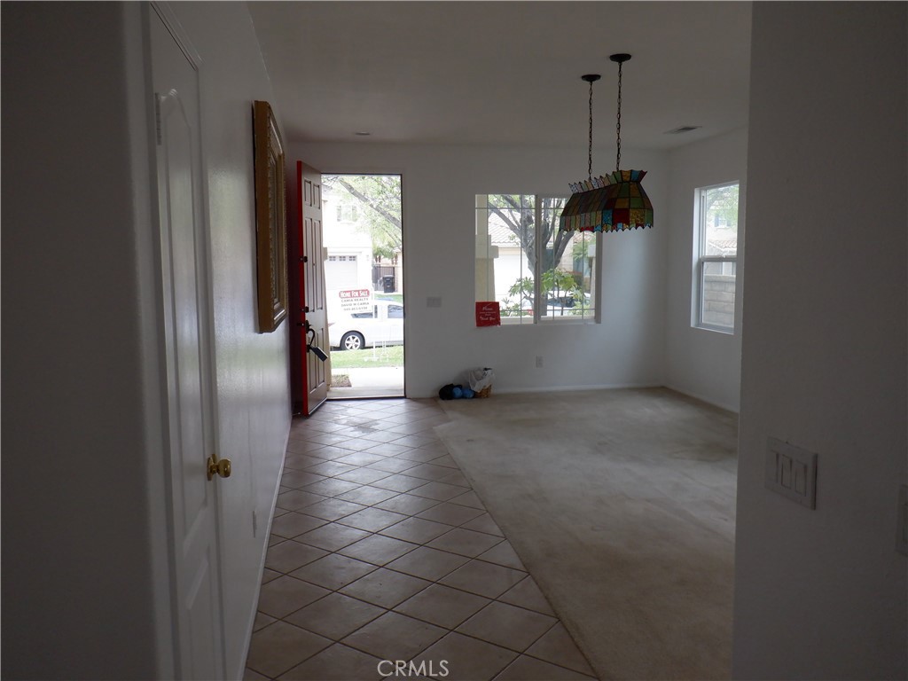 28348 Milbrook Place Castaic, CA 91384 - Photo 14 of 17 a view of empty room with windows