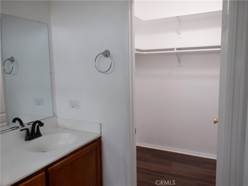 28348 Milbrook Place Castaic, CA 91384 - Photo 9 of 17 a bathroom with a sink and vanity
