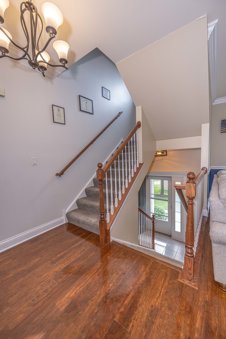 4355 Timber Ridge Court Joliet, IL 60431 - Photo 11 of 24 a view of entryway and hall with wooden floor