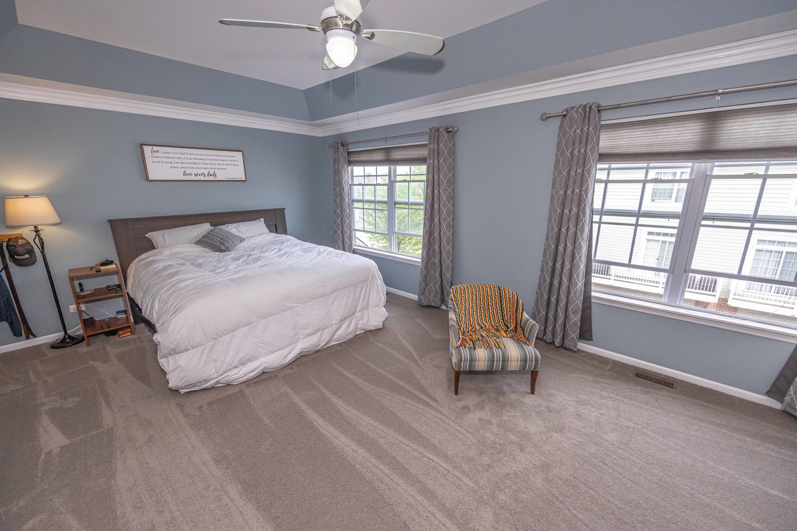 4355 Timber Ridge Court Joliet, IL 60431 - Photo 12 of 24 a bedroom with a bed and a large mirror