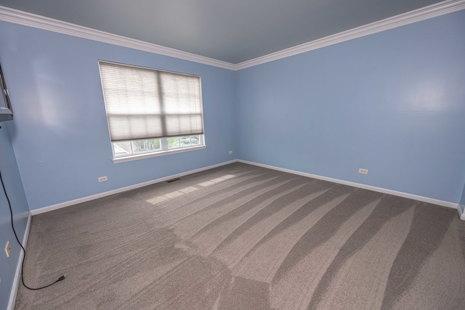 4355 Timber Ridge Court Joliet, IL 60431 - Photo 16 of 24 an empty room with a window