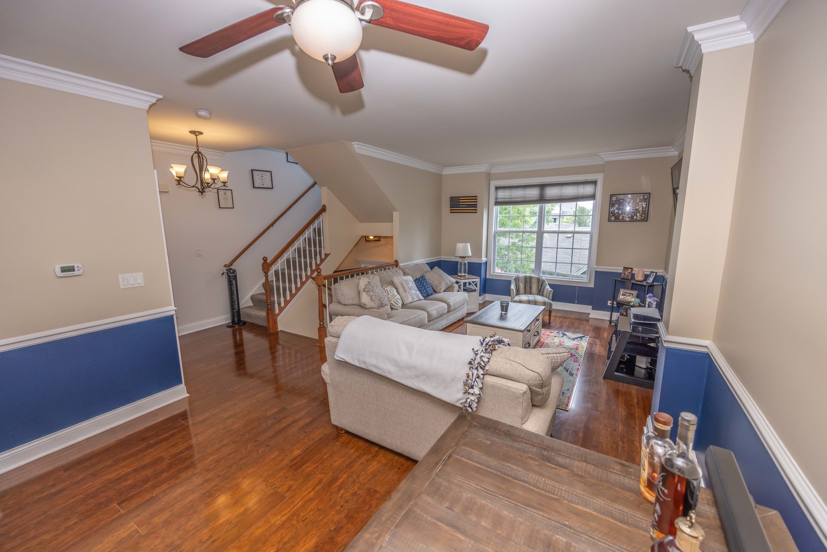 4355 Timber Ridge Court Joliet, IL 60431 - Photo 5 of 24 a living room with furniture and a wooden floor