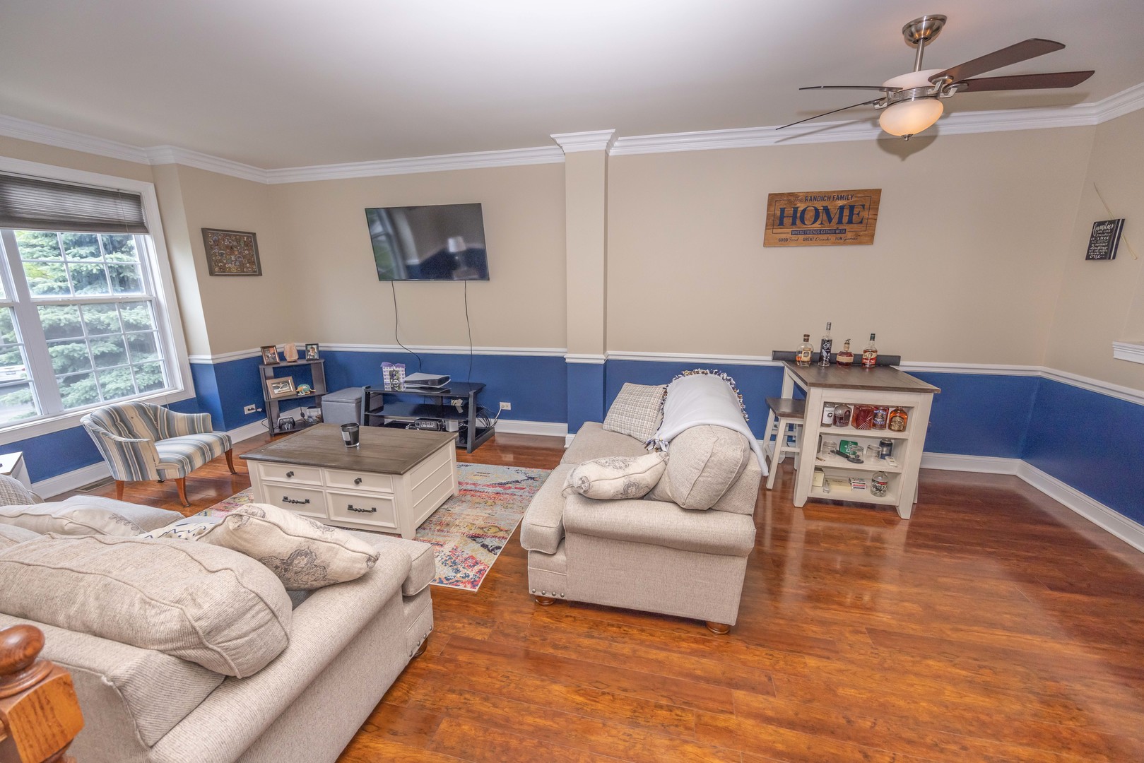 4355 Timber Ridge Court Joliet, IL 60431 - Photo 6 of 24 a living room with furniture and a wooden floor