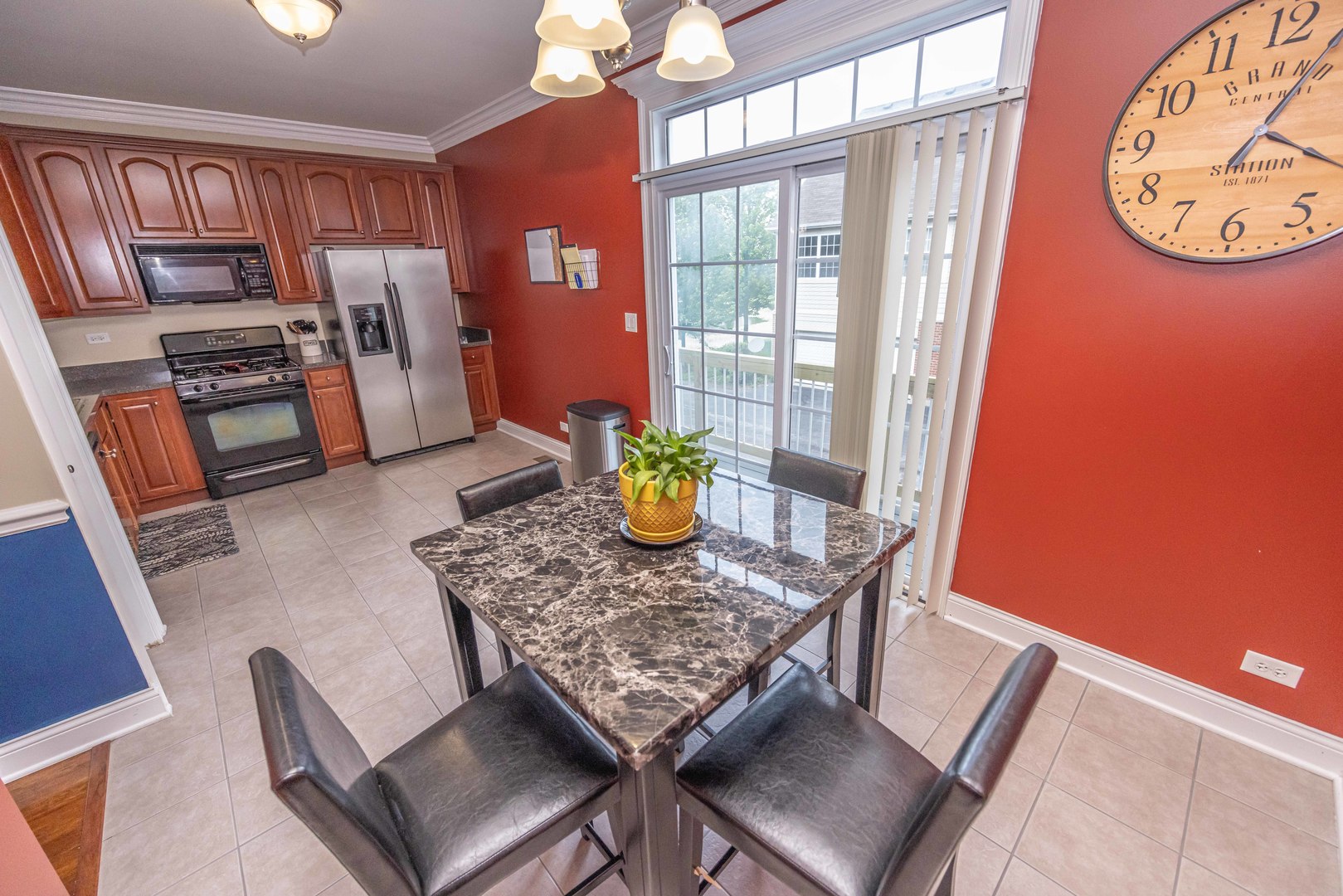4355 Timber Ridge Court Joliet, IL 60431 - Photo 8 of 24 a view of a dining room with furniture window and wooden floor