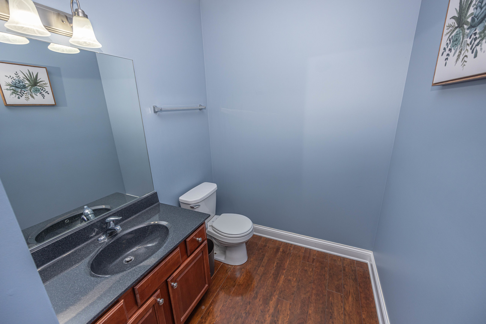 4355 Timber Ridge Court Joliet, IL 60431 - Photo 10 of 24 a bathroom with a sink and a toilet