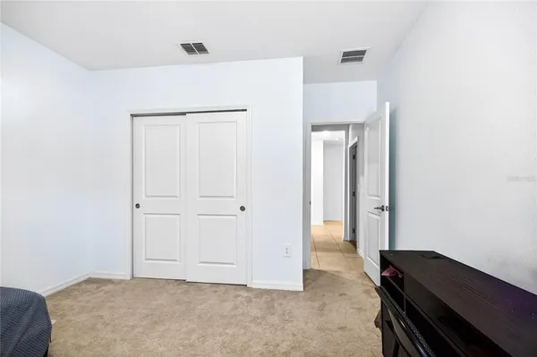 a view of kitchen and hallway