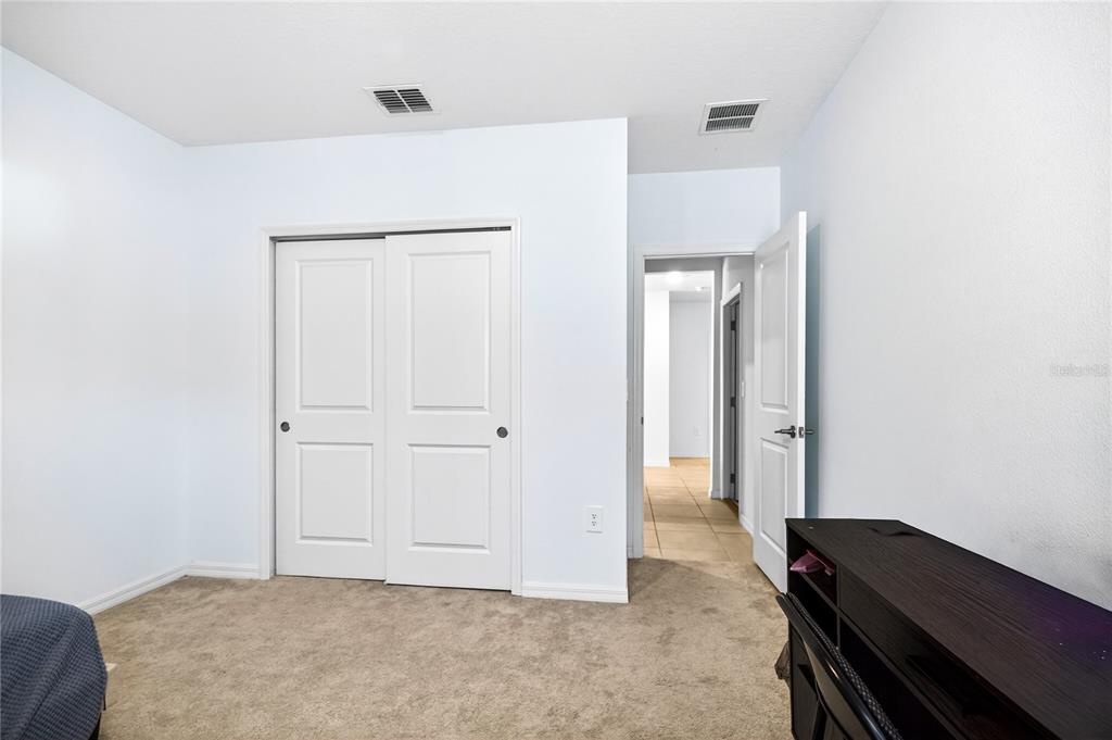 9633 Rampart Road Leesburg, FL 34788 - Photo 23 of 34 a view of kitchen and hallway