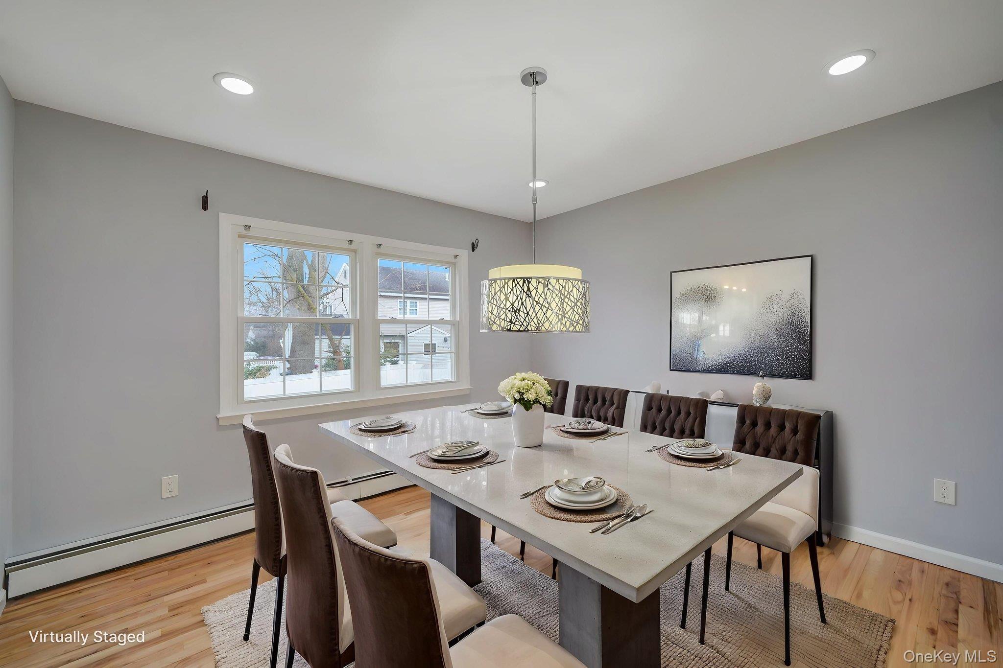 92 Hawthorne Road Kings Park, NY 11754 - Photo 14 of 33 a view of a dining room with a table and chairs