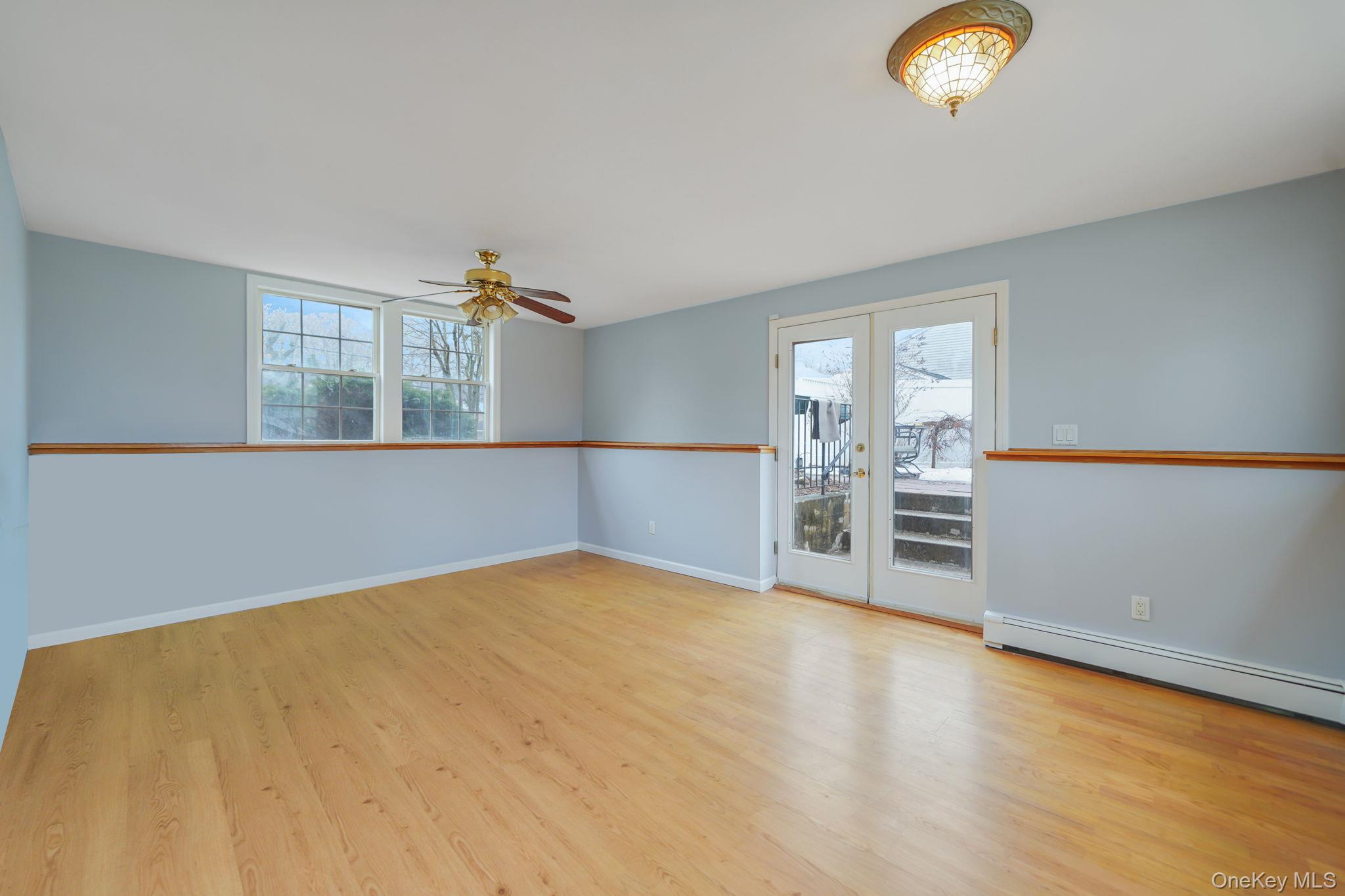 92 Hawthorne Road Kings Park, NY 11754 - Photo 25 of 33 a view of a room with cabinet and windows
