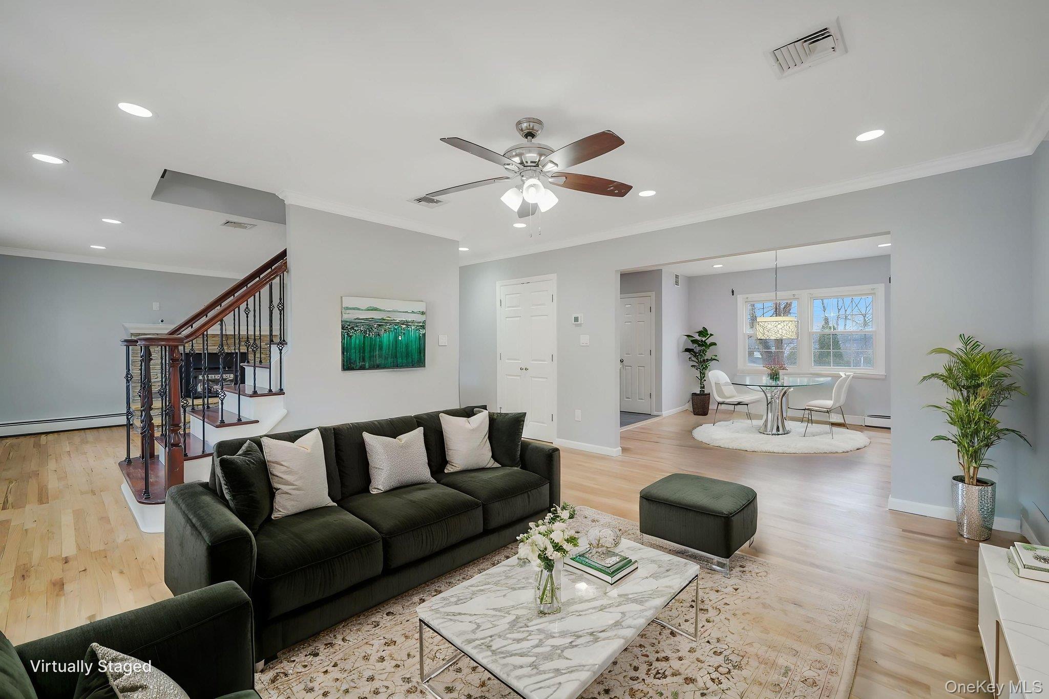 92 Hawthorne Road Kings Park, NY 11754 - Photo 10 of 33 a living room with furniture and wooden floor