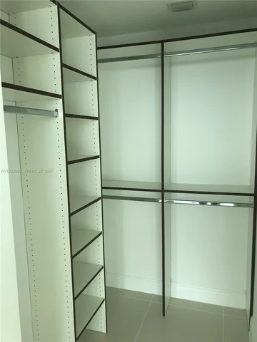 a front view of a house next to a yard