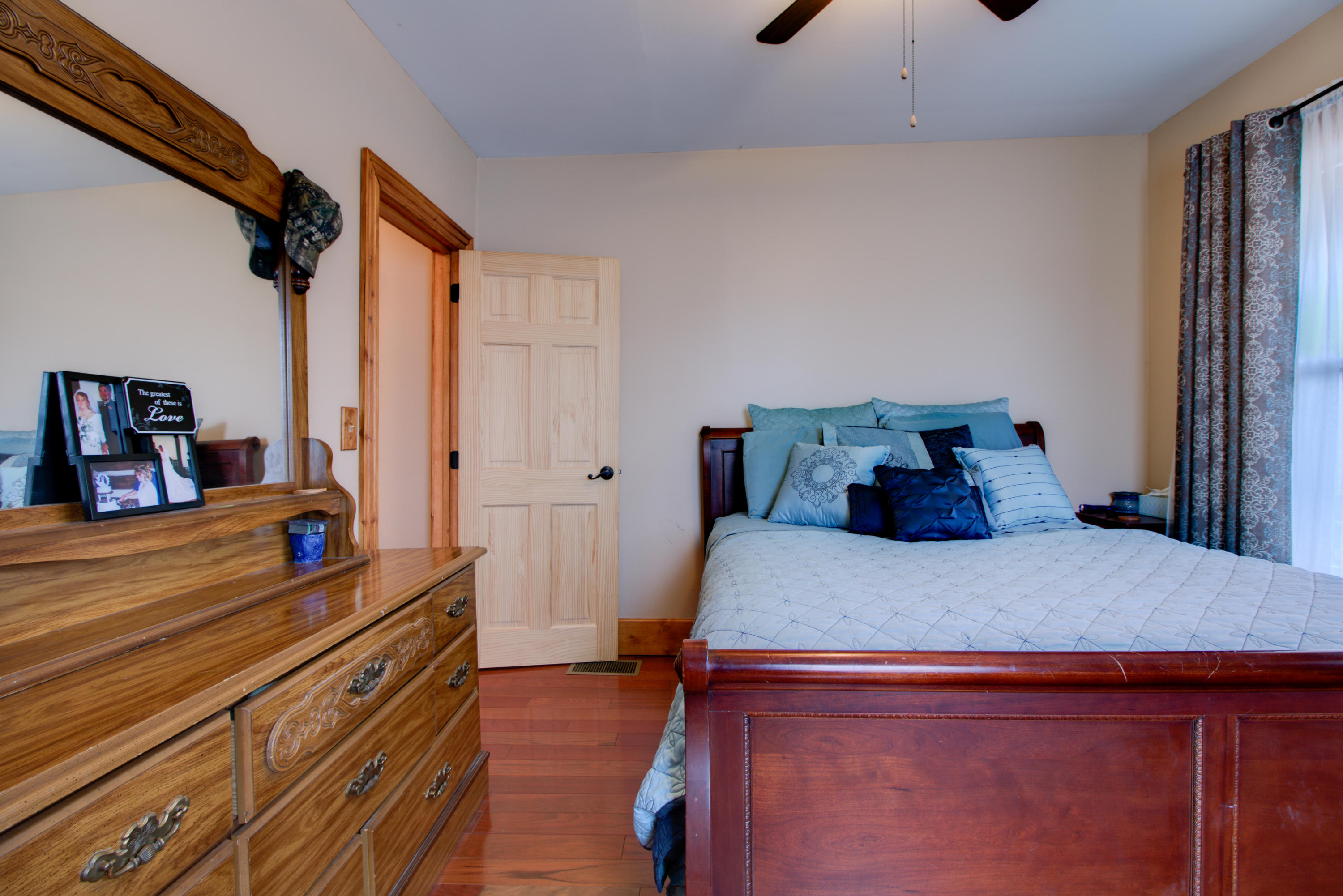 4324 Rakes Road Roanoke, VA 24014 - Photo 17 of 38 a bed room with a bed and a dresser